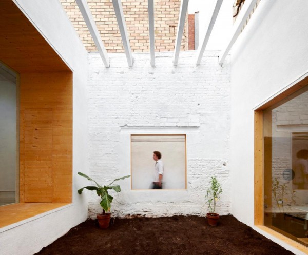 Open courtyard in Barcelona's MAIO Studio allows natural light to flood the artist's spaces. Image by José Hevia via MAIO.