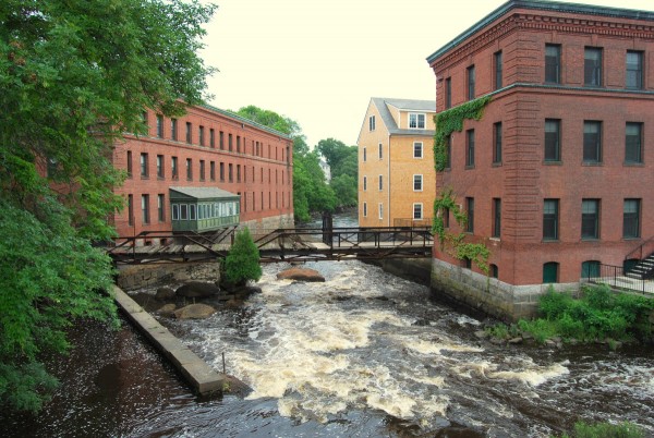 Boston's Baker Chocolate Factory Apartments celebrates its 30th anniversary of adaptive reuse. Image by Marcbela via Wikipedia Commons.