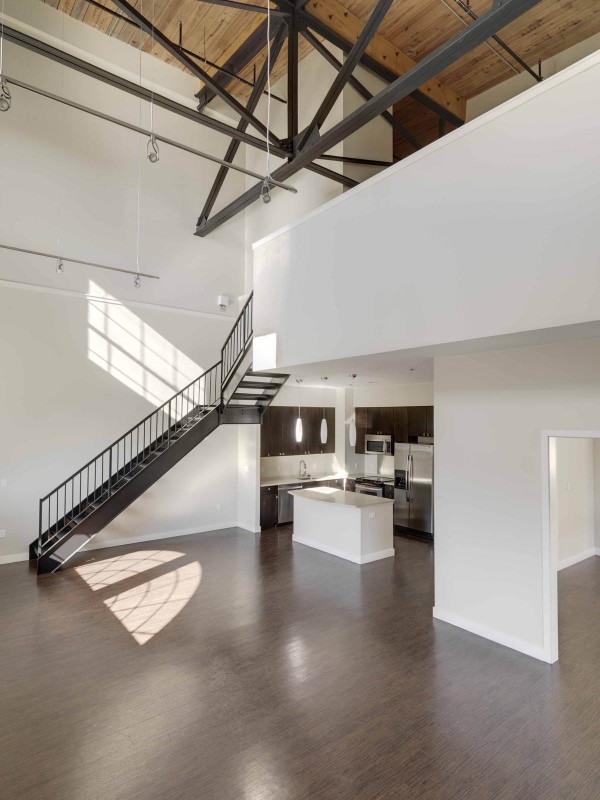 The final phase of the Baker complex renovation includes 17 Watermill Lofts, located in the factory's former boiler room. Image via PRWeb.