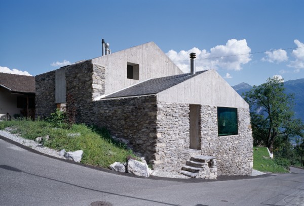... And here is the home as it appears today, with most of the old wood replaced by concrete. Image by Thomas Jantscher via Savioz Fabrizzi Architectes.