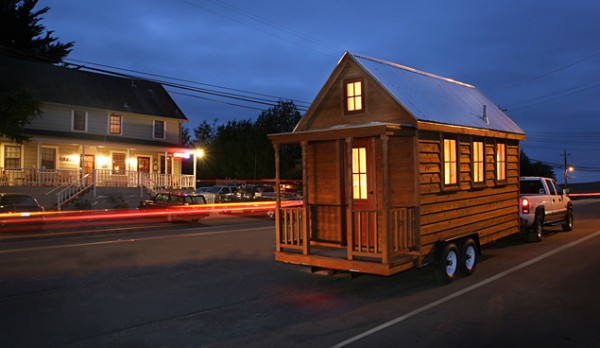 Many models offered by Tumbleweed, such as this Lusby model, measure less than 120 square feet and can fit on a standard trailer for easy transport. Image via Tumbleweed Tiny House Co.