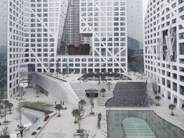 The vast central meeting space amid the LEED Gold-certified complex. Image via Steven Holl Architects.