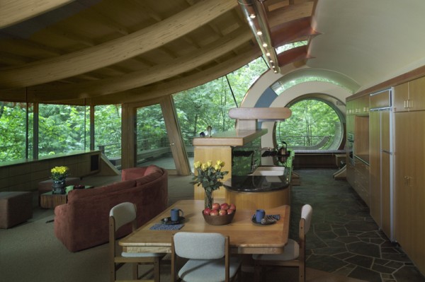 The interior of the Wilkinson House shows the swooping roof and signature circular main entrance. Image by Cameron Neilson via Robert Oshatz.