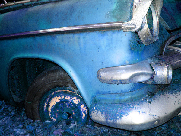 An abandoned Chrysler (image via Curtis Perry/Flickr)